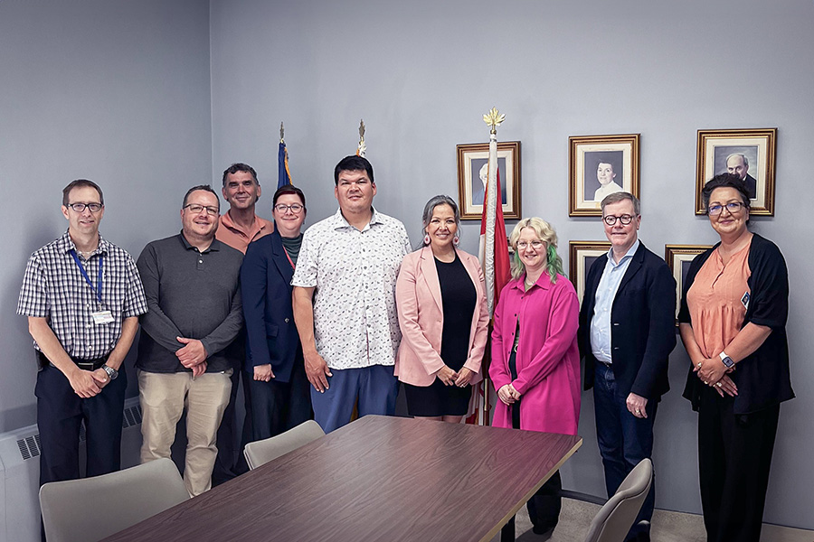 from left to right: Marco Ouellette, Corporate Director of Infrastructure – Vitalité; Yves Larochelle, Patient Flow Coordinator and Stella-Maris-de-Kent Hospital representative (acting) –Vitalité; Marc Després, Manager of Building Modifications – Vitalité; Lisa Lyn Roy, Director of Patient Flow and Logistics at the Dr. Georges-L.-Dumont University Hospital Centre – Vitalité; Aaron Sock, Chief of the Elsipogtog First Nation; Natasha Sock, Director of the Elsipogtog Health and Wellness Centre; Arianne Malouin, Senior Real Estate Planning Advisor for CIM Conseil; Donald Haineault, Director of Clinical Planning for CIM Conseil; and Joanna Martin, Regional Manager of First Nations Health Services – Vitalité.